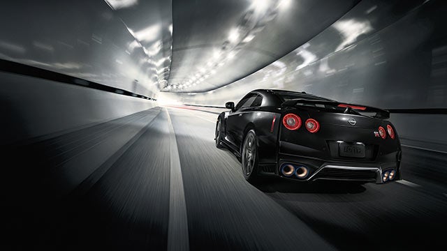 2023 Nissan GT-R seen from behind driving through a tunnel | Coughlin Nissan of Heath in Heath OH