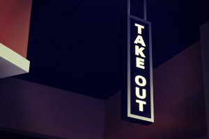 A sign that says "TAKEOUT".