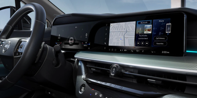 Nissan vehicle interior featuring a digital dashboard, touchscreen display, and infotainment system